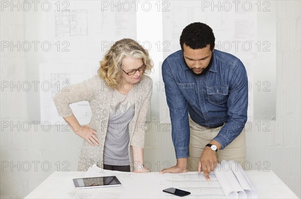 Architects working together in office