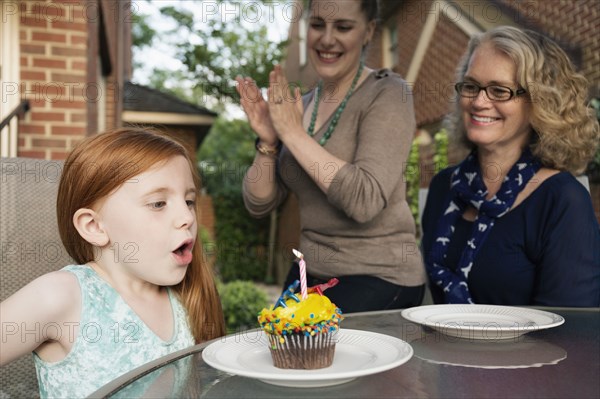 Three generations of Caucasian women celebrating birthday