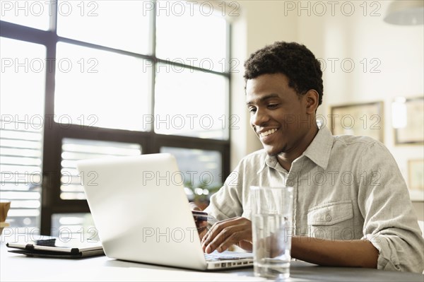 Black businessman working at desk