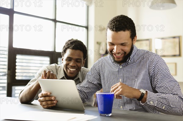 Businessmen working together in office