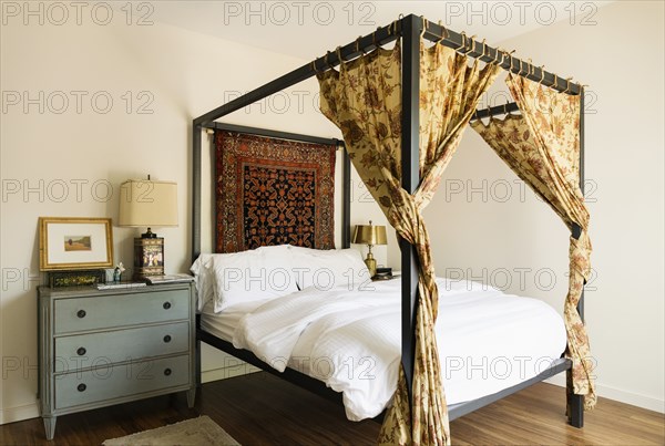 Canopy bed in bedroom
