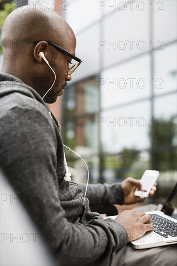 Black man using laptop