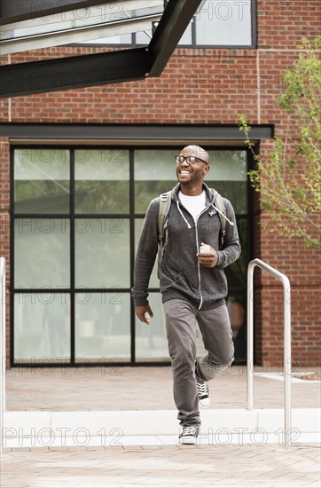 Black man walking in city