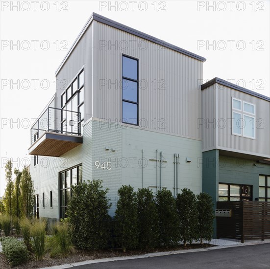 Modern condo building and parking lot