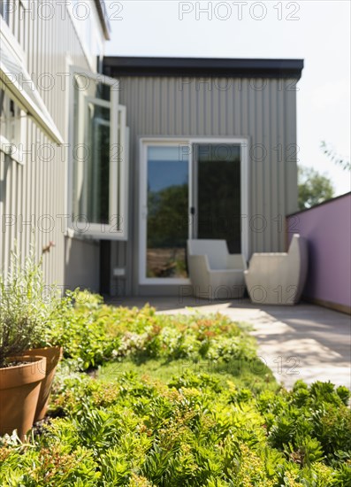 Landscaping and patio of modern condo building