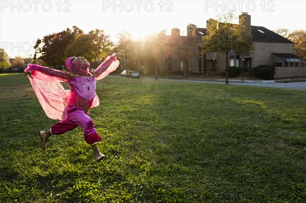 African American girl dancing in princess costume