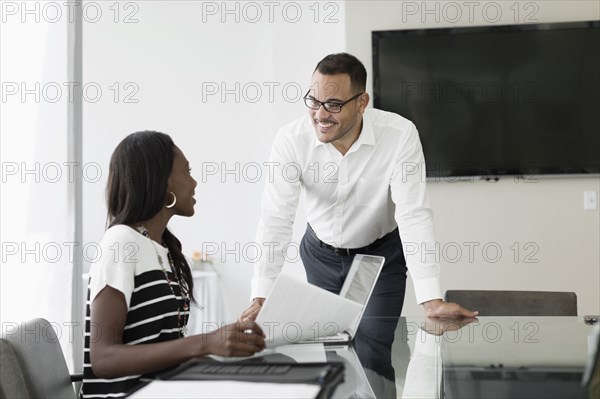 Business people talking in conference room
