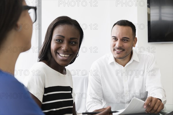 Business people talking in office meeting