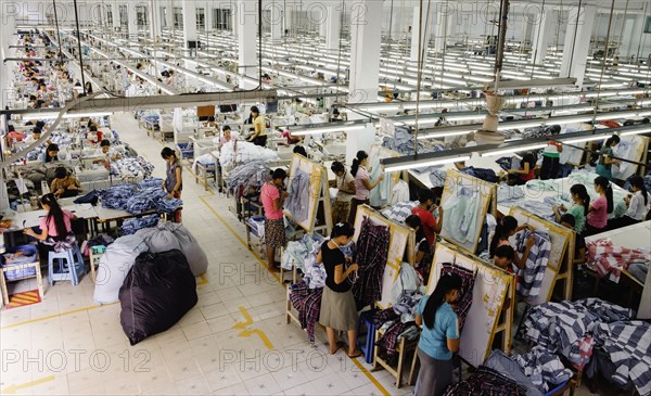 High angle view of workers in garment factory