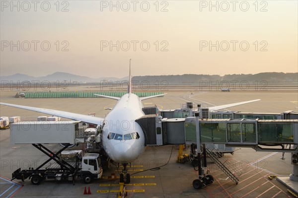 Airplane and walkways at airport