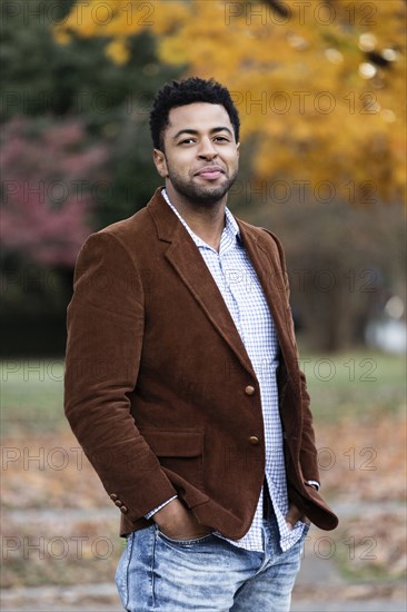 African American businessman smiling outdoors