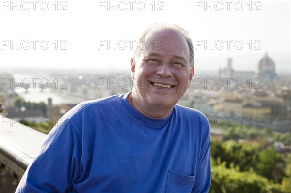 Caucasian man smiling outdoors