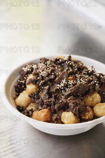 Bowl of steak and tater tots