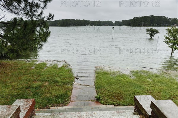 Flooding at bottom of staircase outdoors