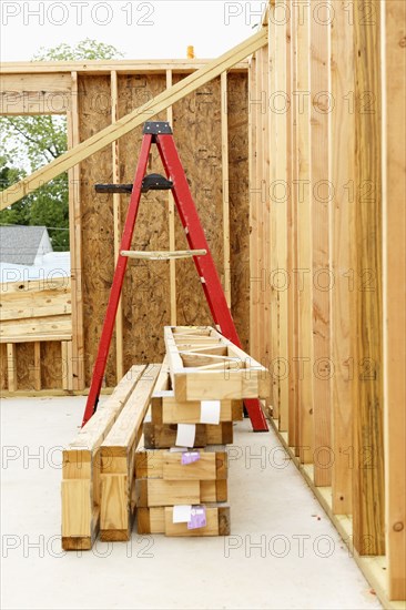 Ladder and wooden frame at construction site