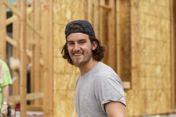 Portrait of smile Caucasian man at construction site