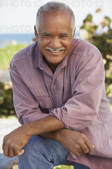 Senior man laughing outdoors