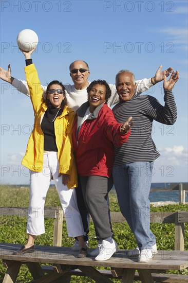 Group senior friends with volley ball