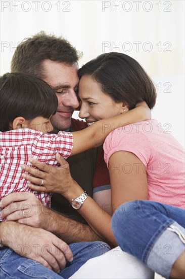 Indian family hugging