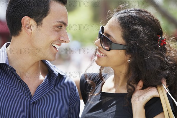 Couple smiling at each other