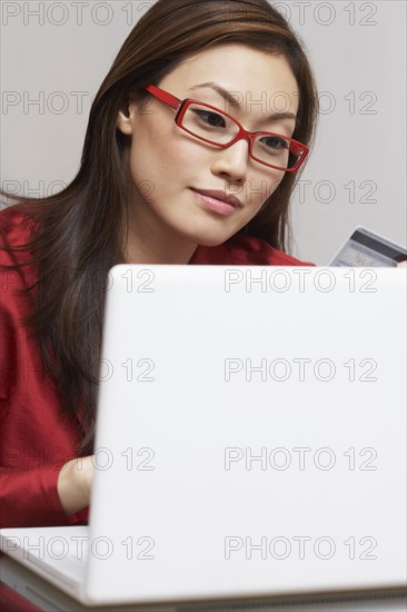 Asian businesswoman shopping online