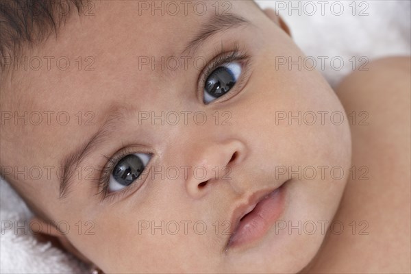 Close up of mixed race baby girl