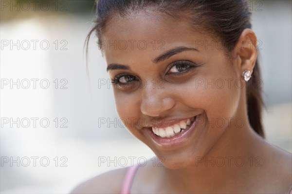 Hispanic teenager smiling