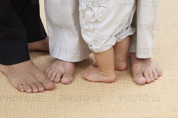 Close up of Hispanic family's feet