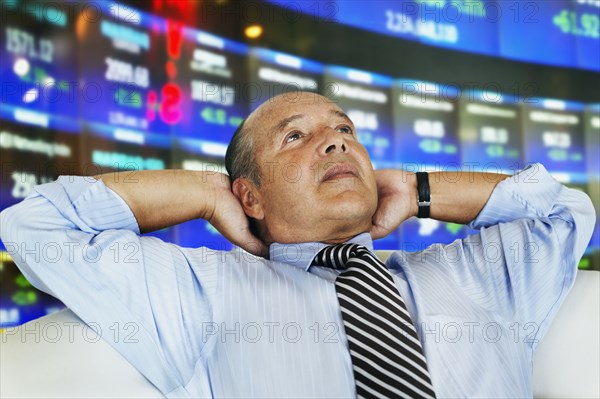 Hispanic businessman at stock exchange