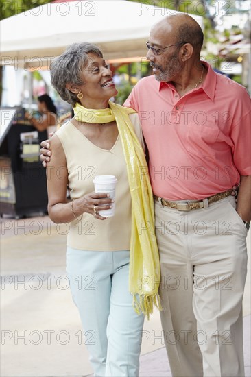 African couple walking together