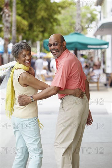 African couple walking together