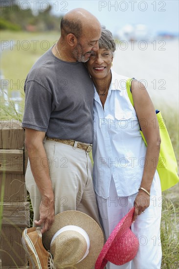 African couple hugging