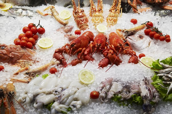 Close up of seafood displayed on ice