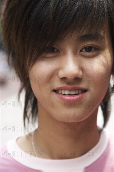 Smiling Chinese teenager