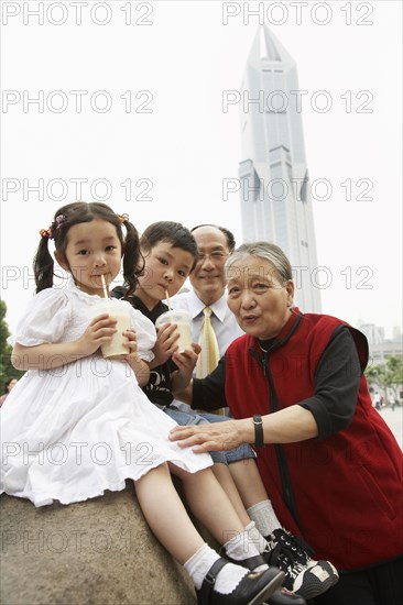 Chinese grandparents enjoying grandchildren