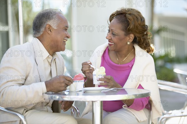 Couple eating ice cream together