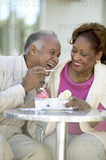 Couple eating ice cream together