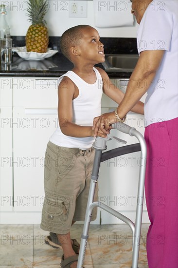 African American grandson talking to grandmother