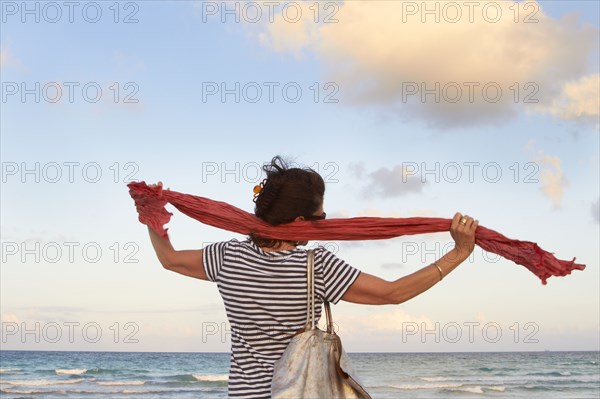 Caucasian woman enjoying beach