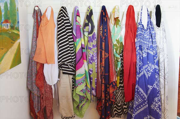 Clothes hanging on pegs