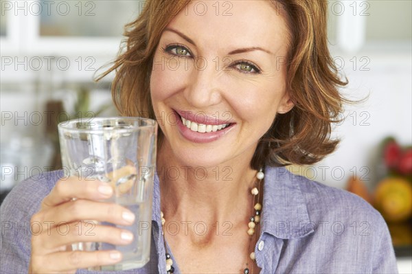 Caucasian woman drinking water