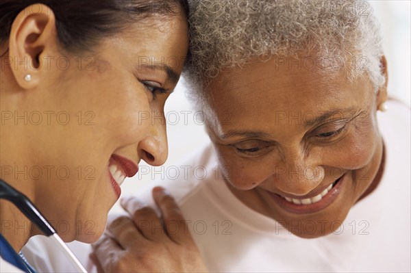 Nurse talking to Senior patient in hospital