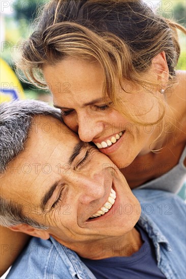 Caucasian couple smiling outdoors