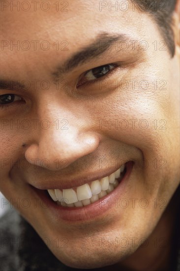 Close up of man's smiling face