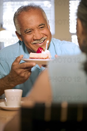 Senior couple celebrating birthday together