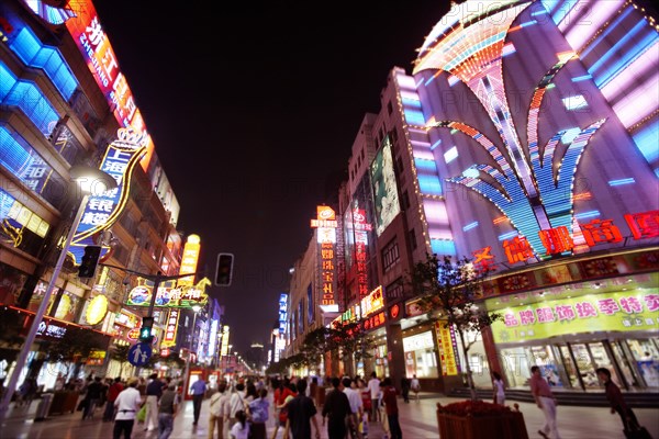 City street lit up at night