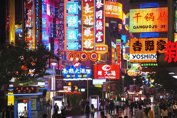 City street lit up at night