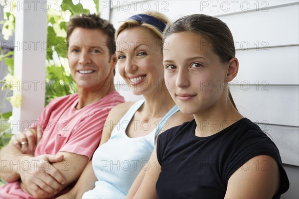 Family sitting together outdoors