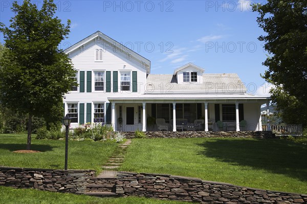 Stone wall outside suburban house