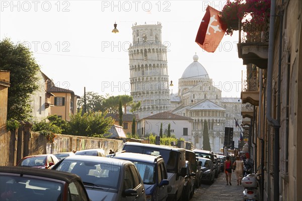 View of the Leaning Tower of Pisa from city street